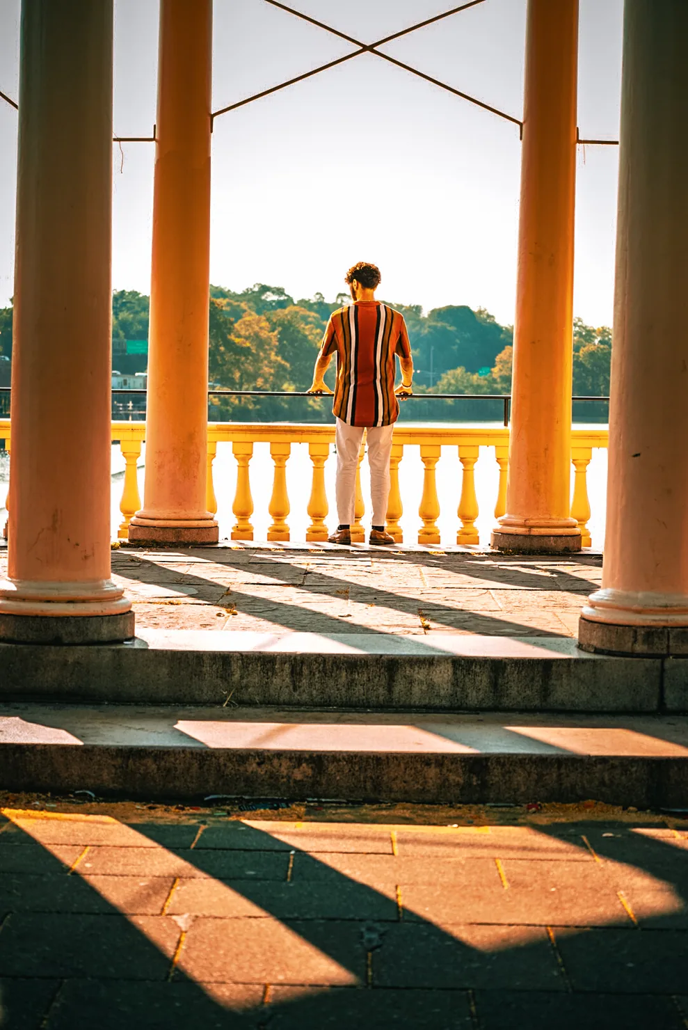 Golden-hour portrait near the waterfront by CM Exclusive Photography